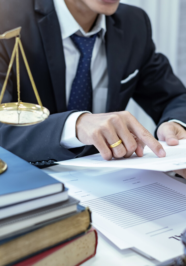 Businessman and lawyer going over documents